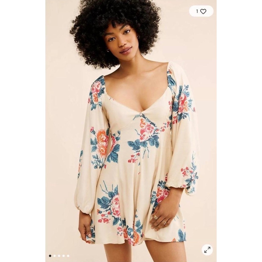Free People Francesca Mini Dress in a warm ivory floral print | Med